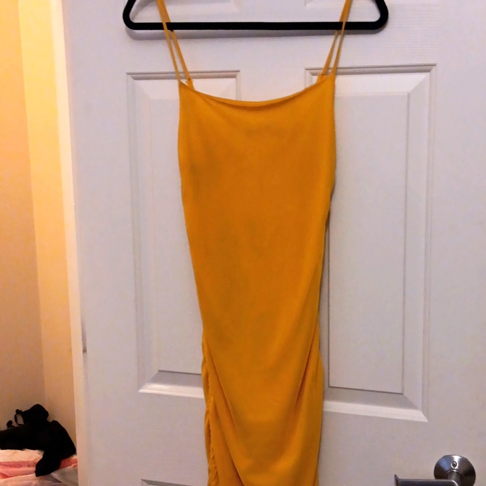 I'm selling this gold dress